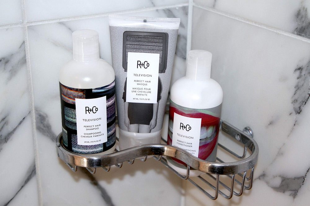 R+Co Television Masque on hair with soft shine.