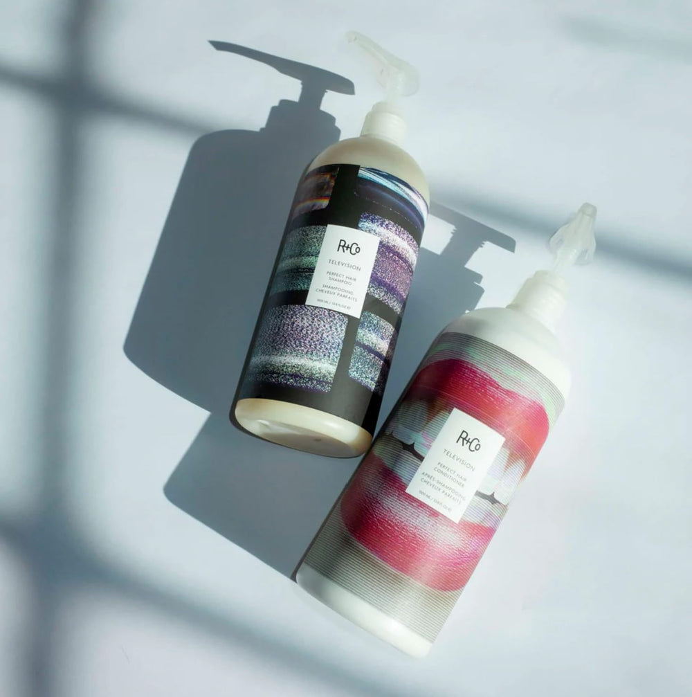 R+Co Television Perfect Hair Shampoo gloss close-up showing silky texture and shine potential.
