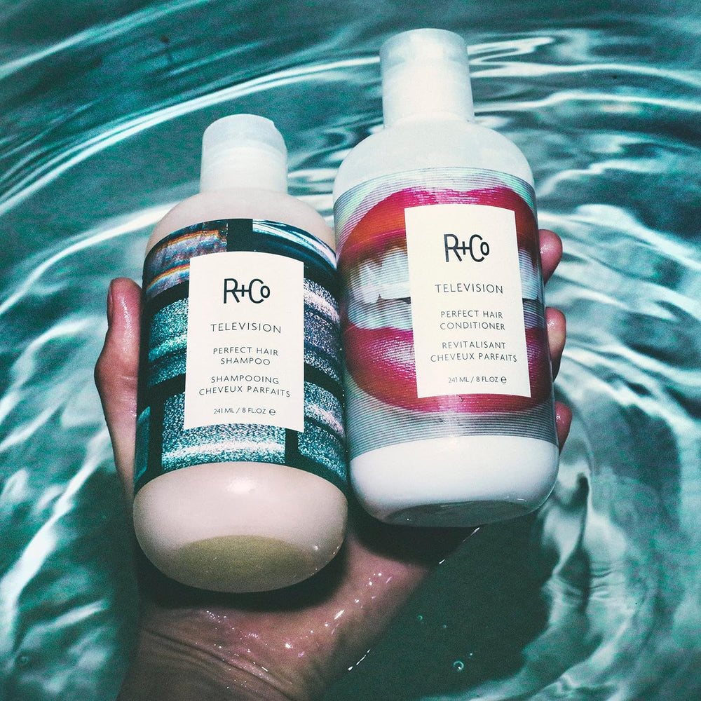 R+Co Television shampoo pour captured for a salon-like cleansing ritual