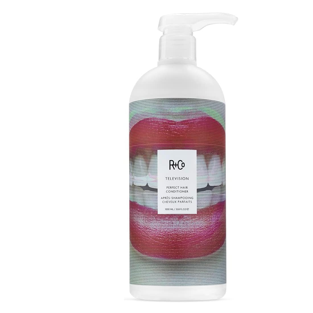 R+Co Television Perfect Hair Shampoo pump dispenses creamy lather, suggesting a luxurious cleanse.