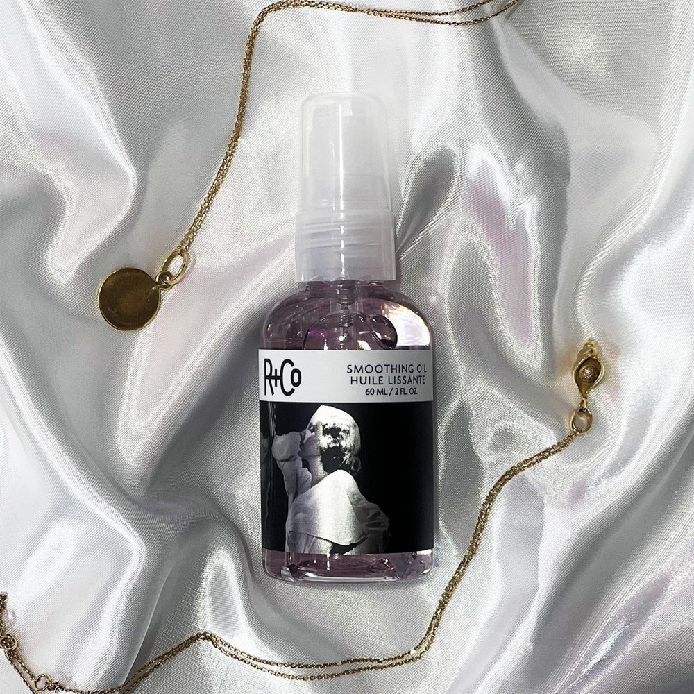 R+Co Two Way Mirror smoothing oil on hair close-up shows polished lustre.