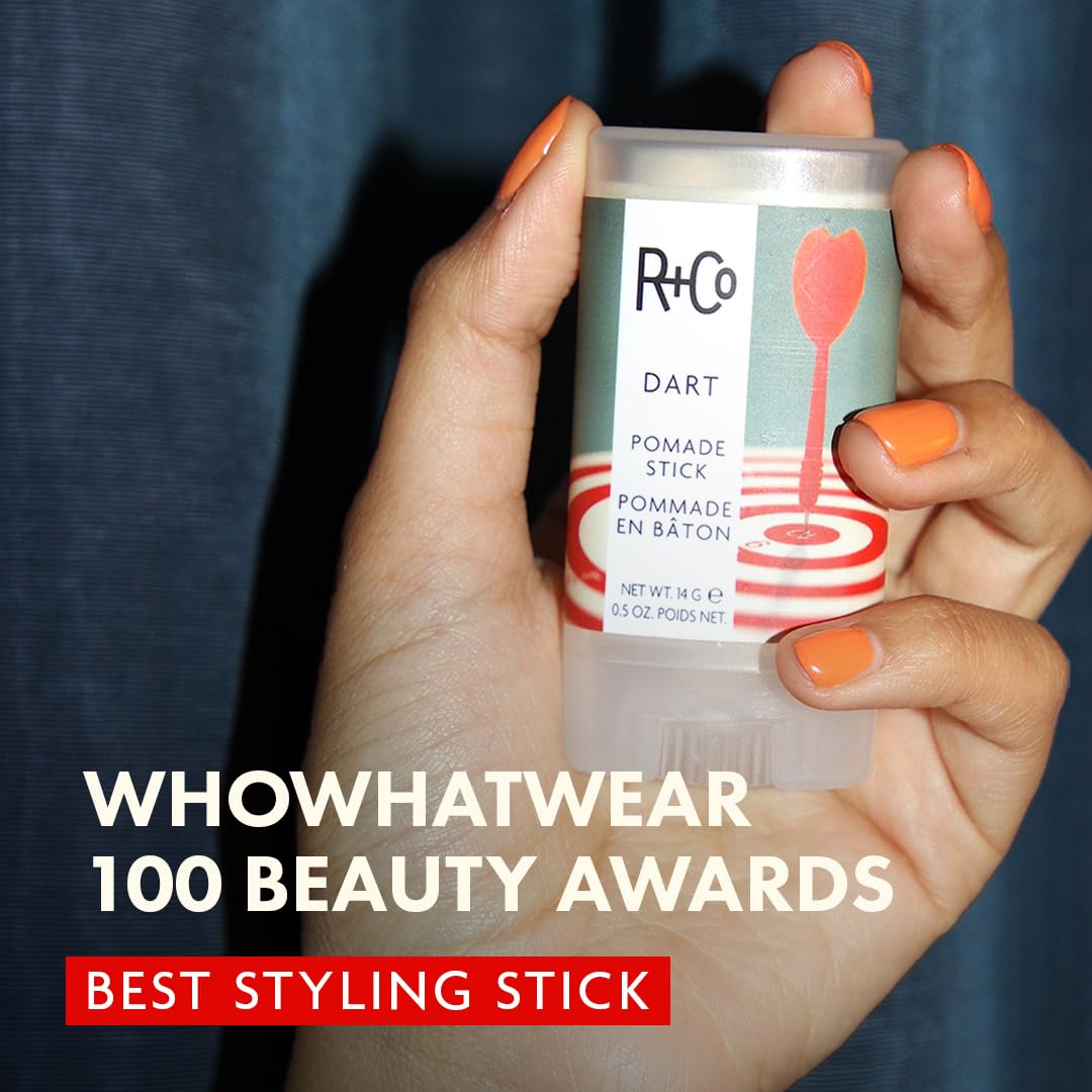 R+Co DART Hair Wax Stick smoothing strands for a clean finish.