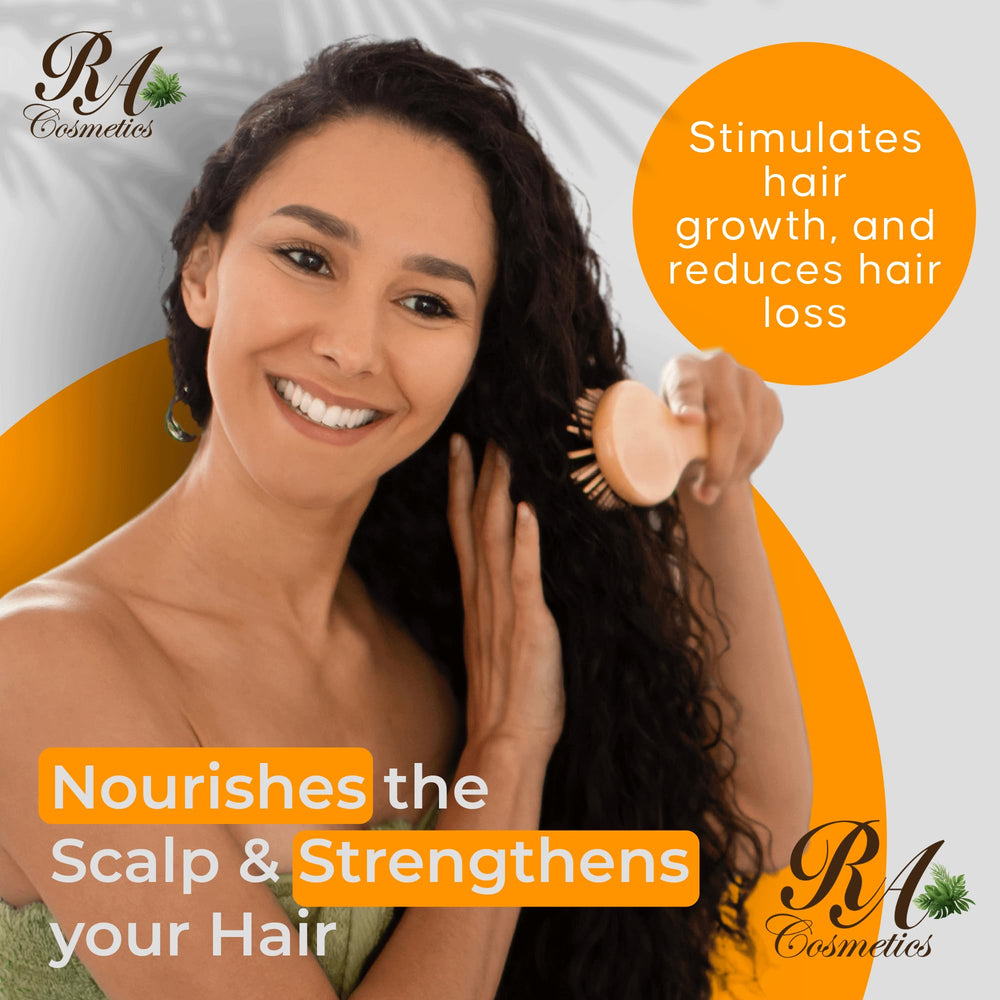 RA COSMETICS Batana Oil being massaged into scalp demonstrates nourishing scalp care