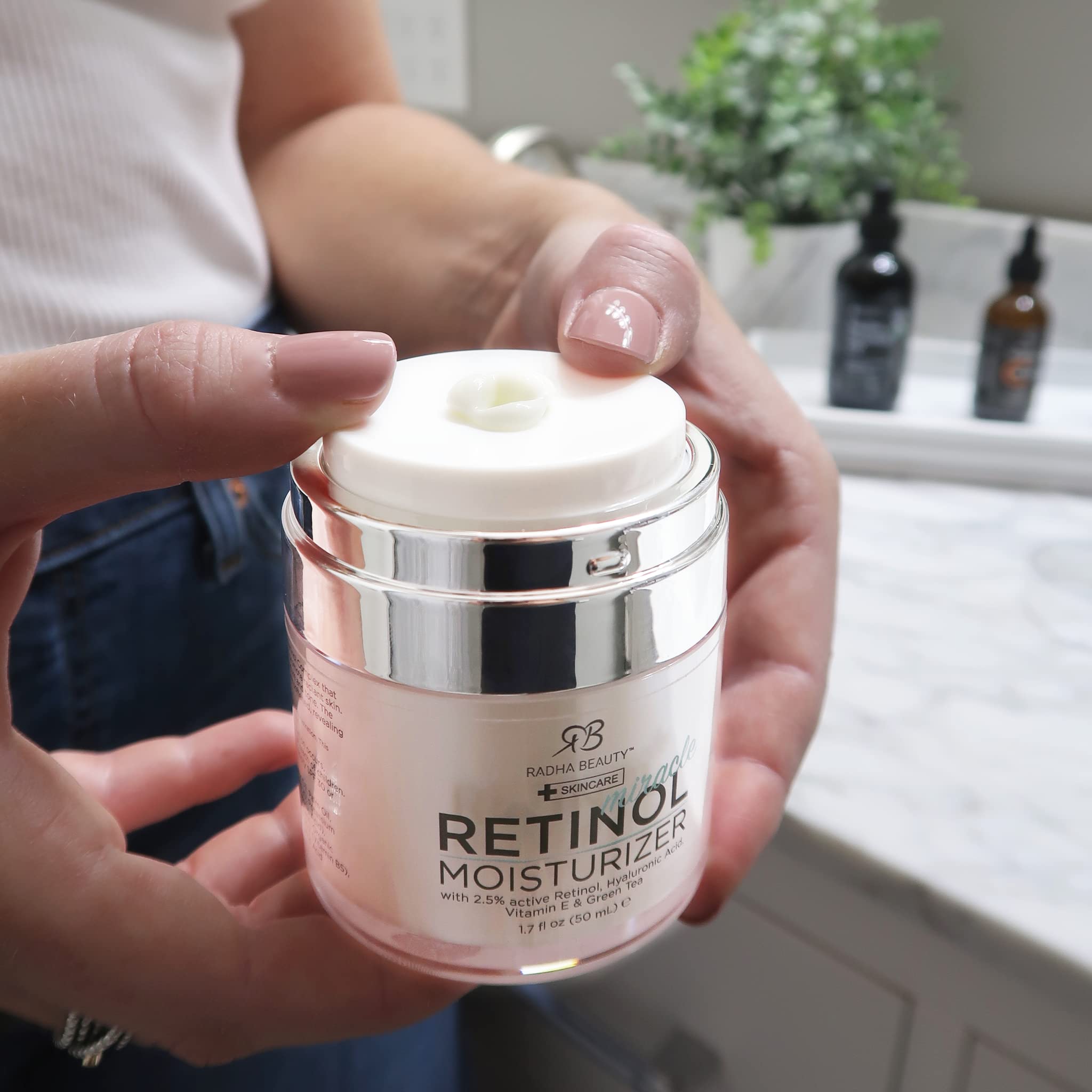 Radha Beauty retinol cream jar close-up showing plump, refreshed skin