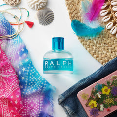 Ralph Lauren Fragrances Eau de Toilette bottle with pink magnolia accent near the cap, perfect for floral moods.