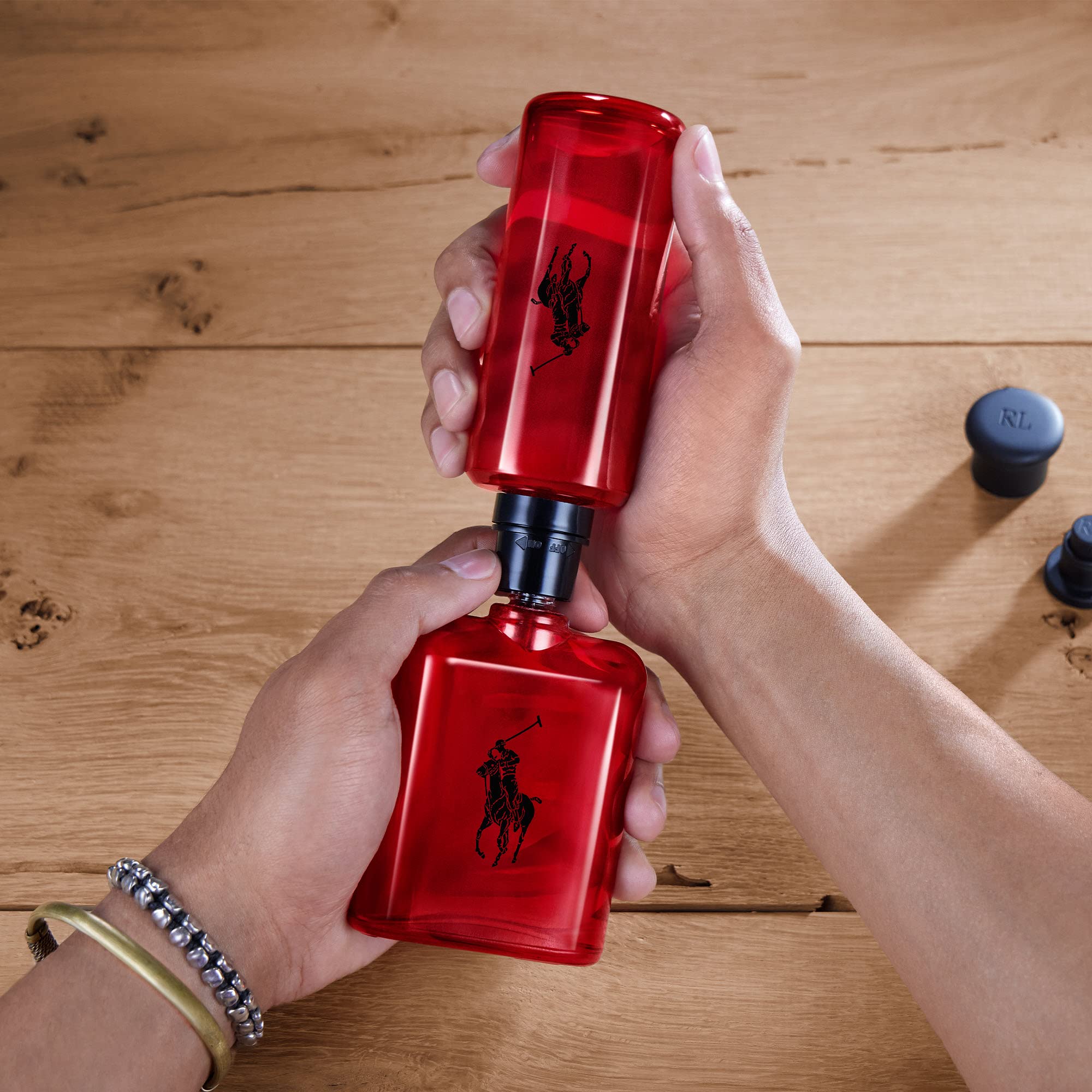 Ralph Lauren Polo Red bottle close-up highlighting woody and spicy notes for confident daily wear.