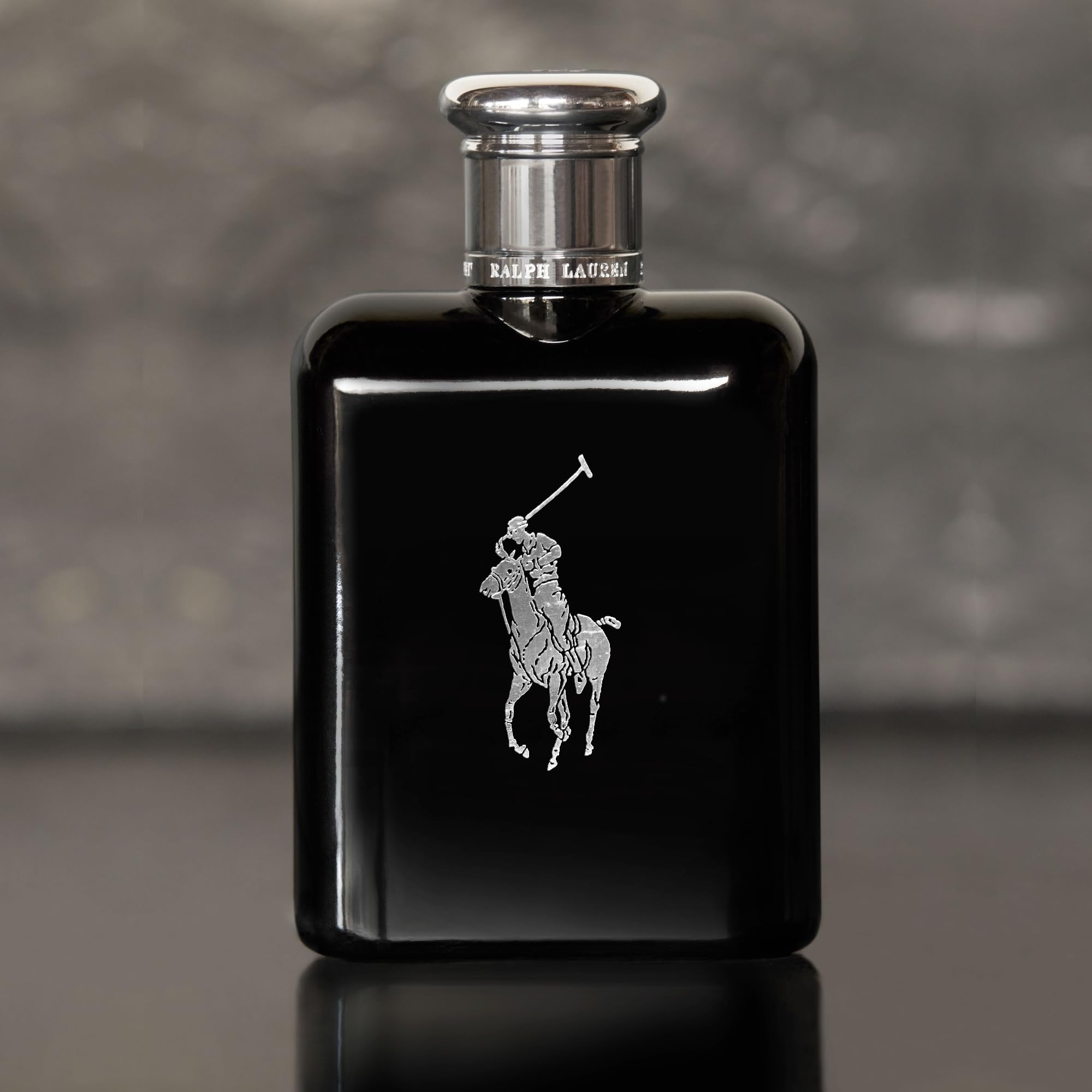 Ralph Lauren Polo Black spray on pulse points for lasting scent.