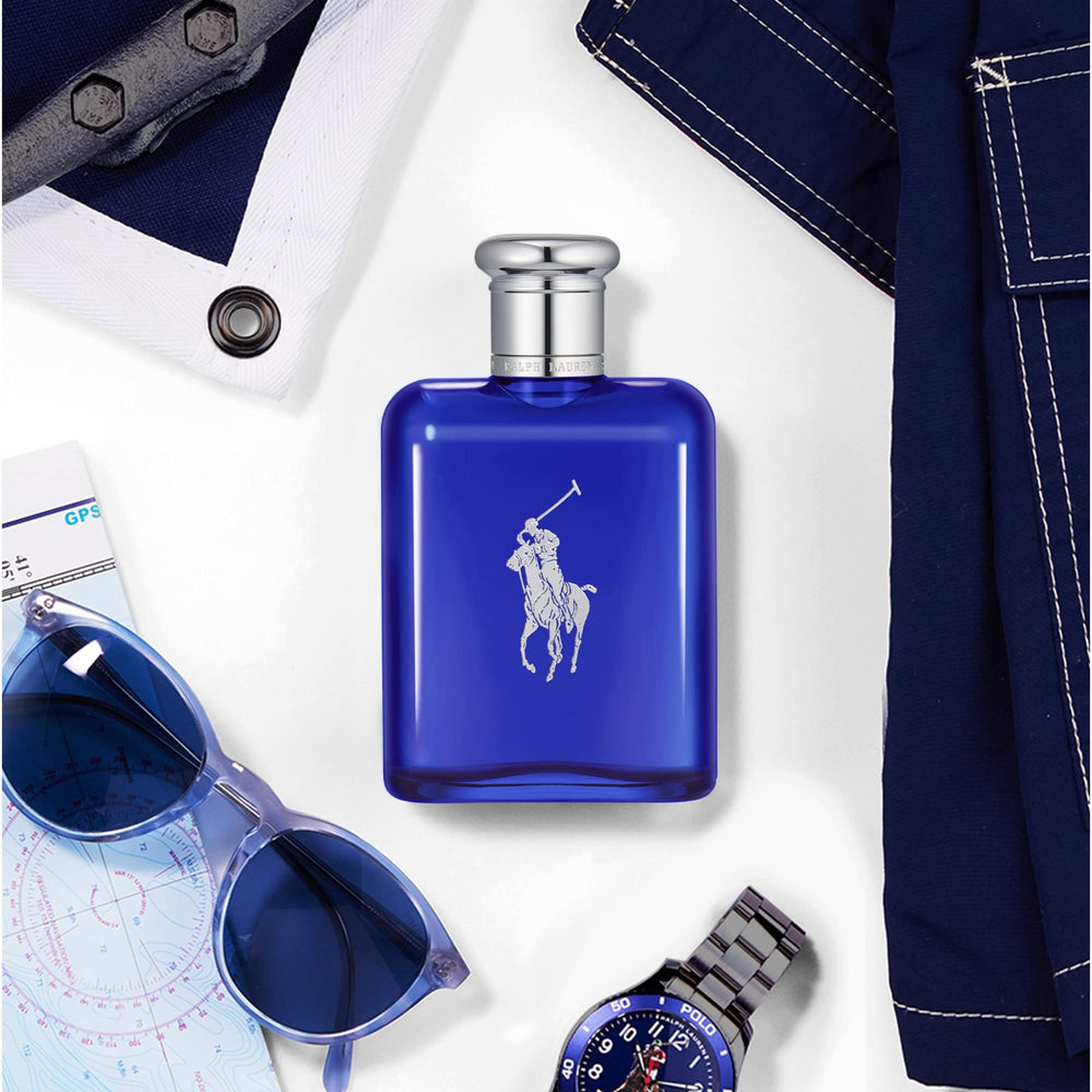 Polo Blue bottle with ocean backdrop conveys aquatic lifestyle and ease.