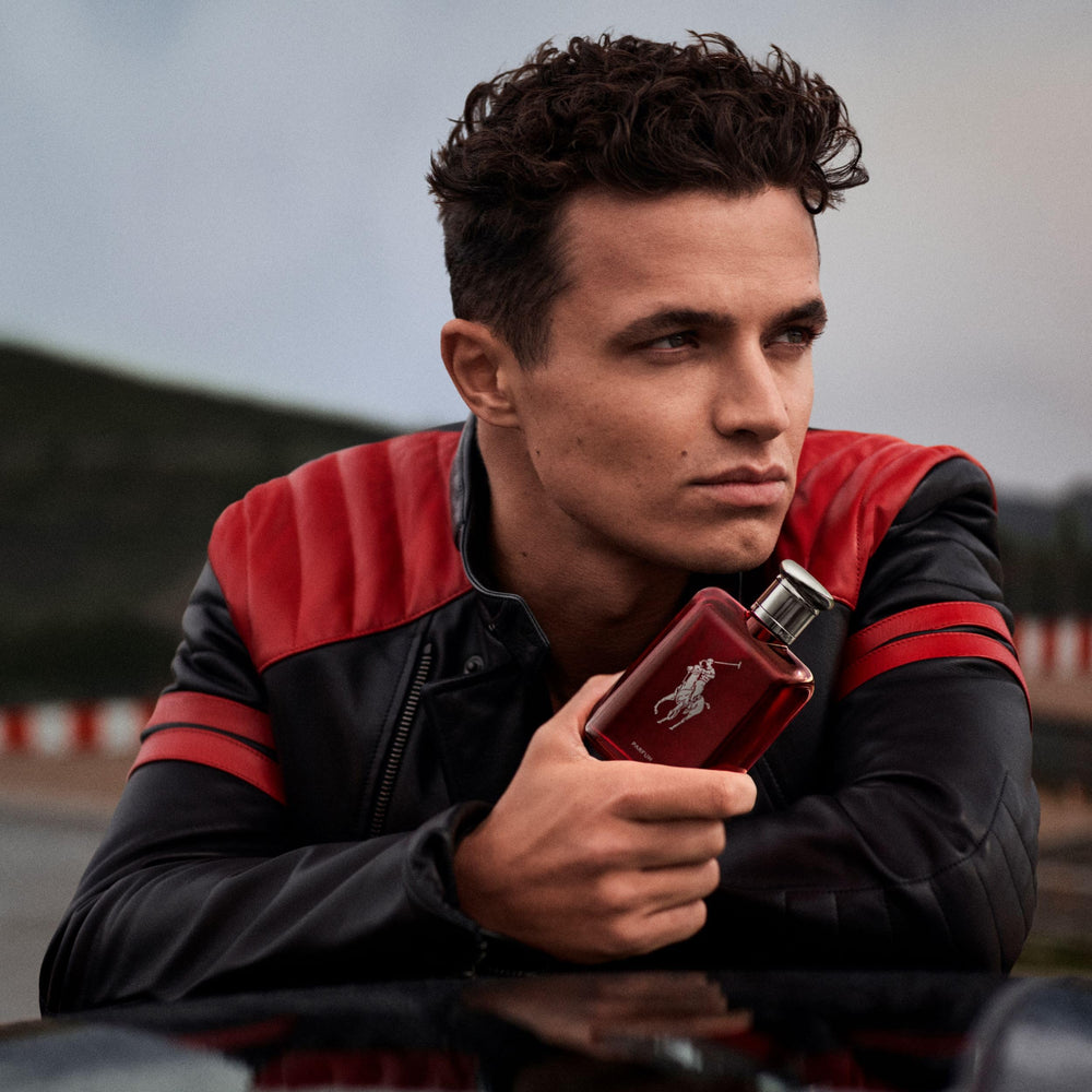 Ralph Lauren Polo Red Parfum spray-action image showing effortless application