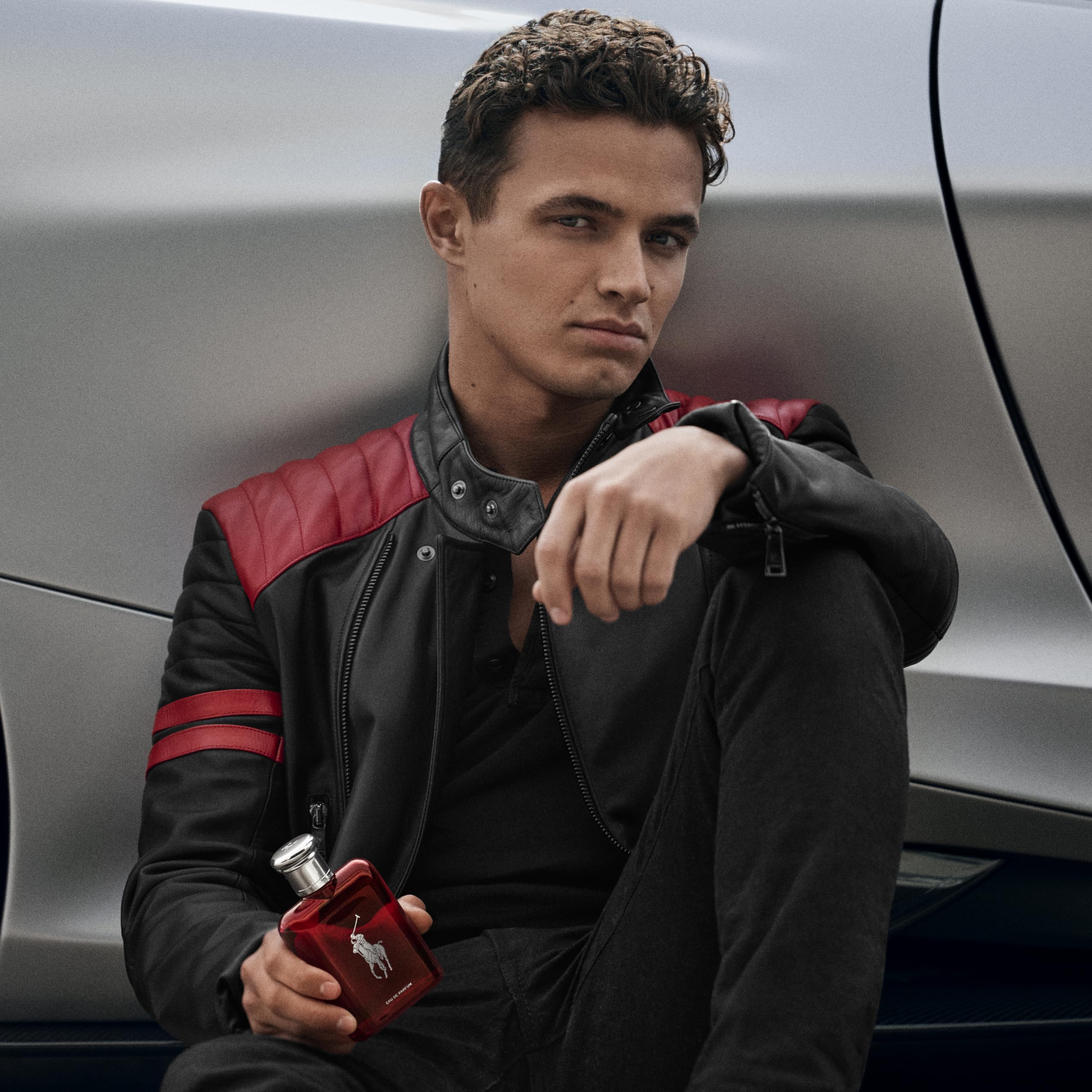 Polo Red bottle with polo pony emblem signals timeless luxury.