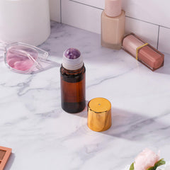 RAMFIYN purple crystal rollerball enables precise, controlled application for targeted skincare.