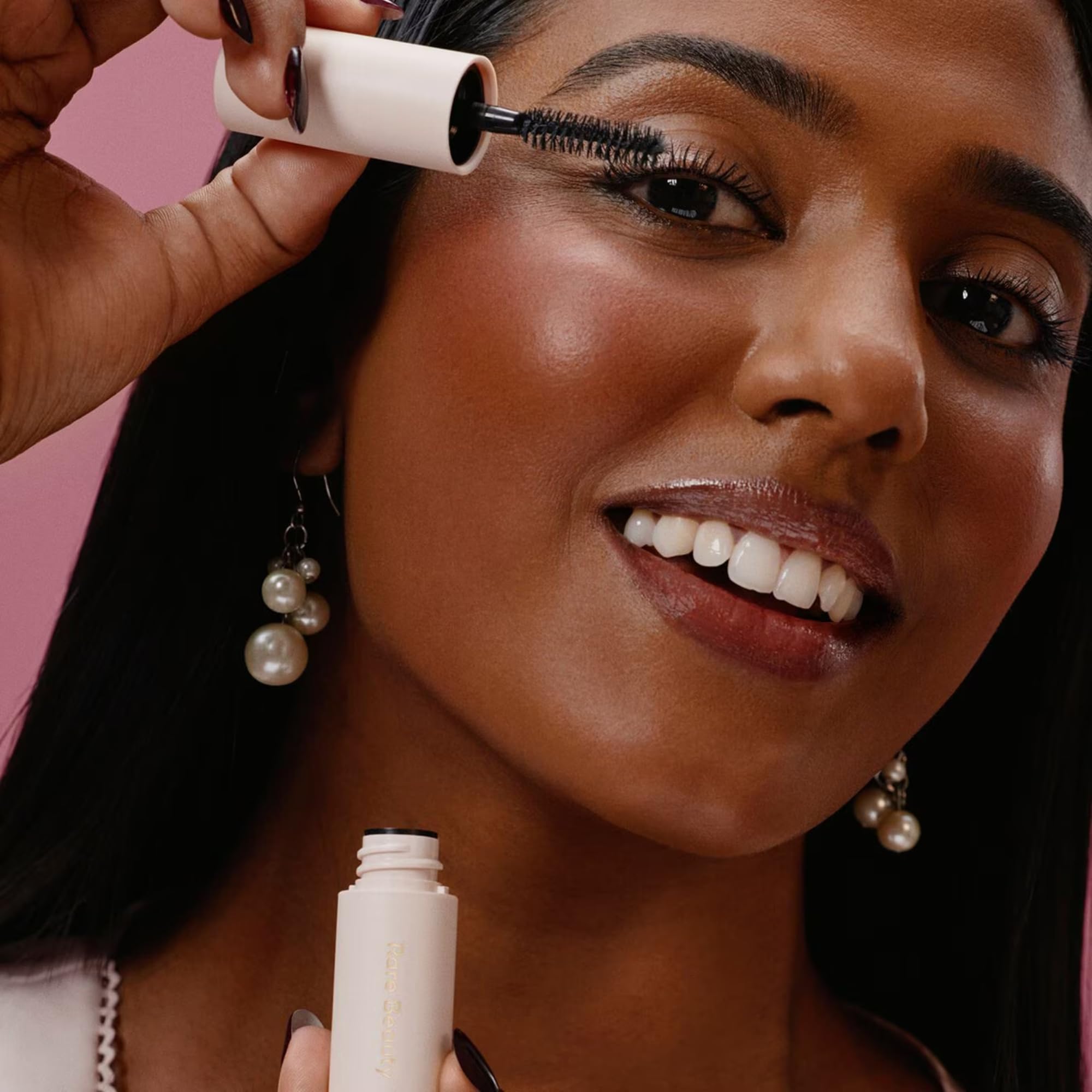 Rare Beauty Brow Harmony gel application tube closeup for flexible brow shaping.