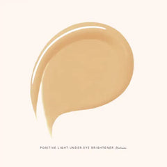 Rare Beauty under eye brightener Medium application on skin demonstrates lightweight coverage