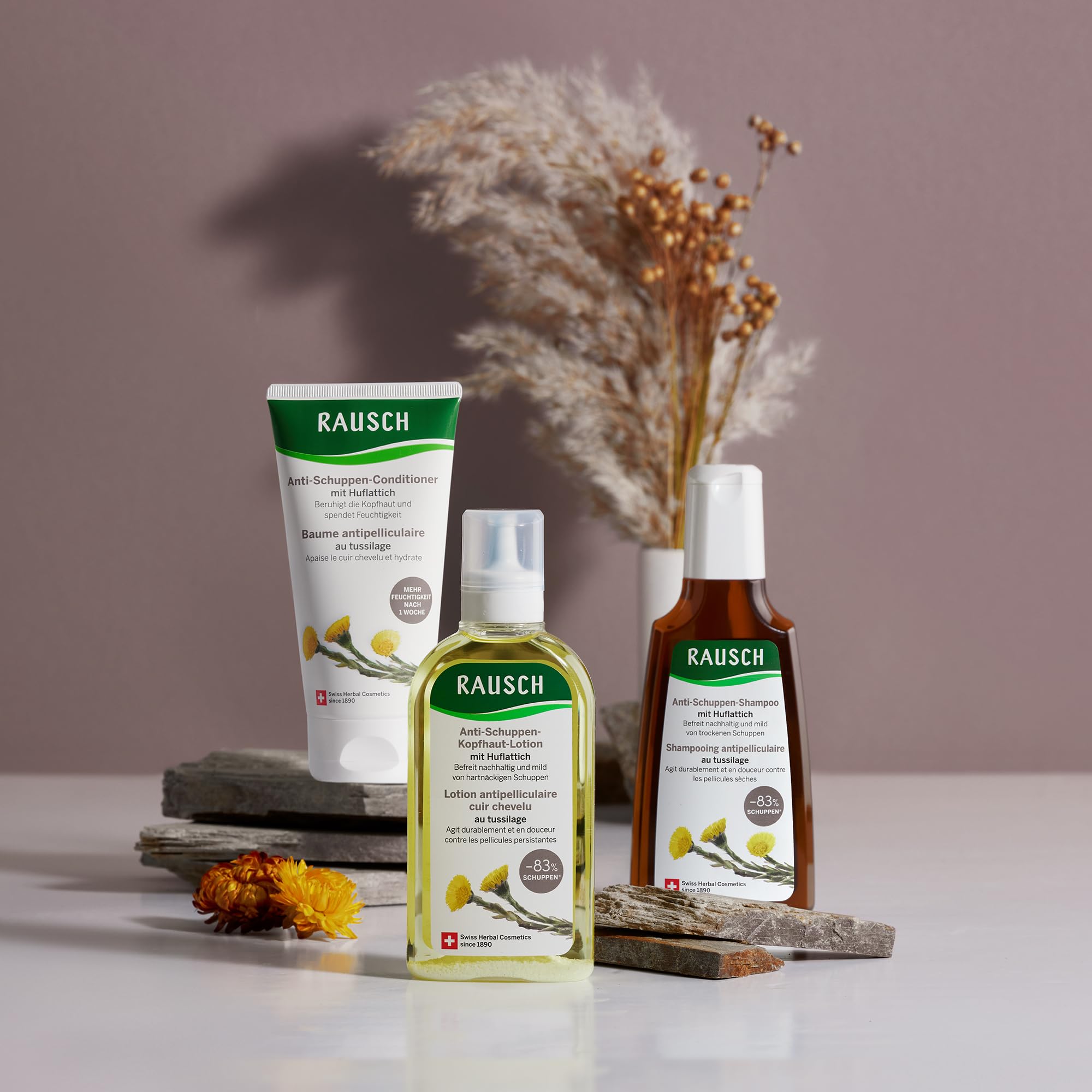 RAUSCH Coltsfoot shampoo texture on hair during application suggests smooth cleansing