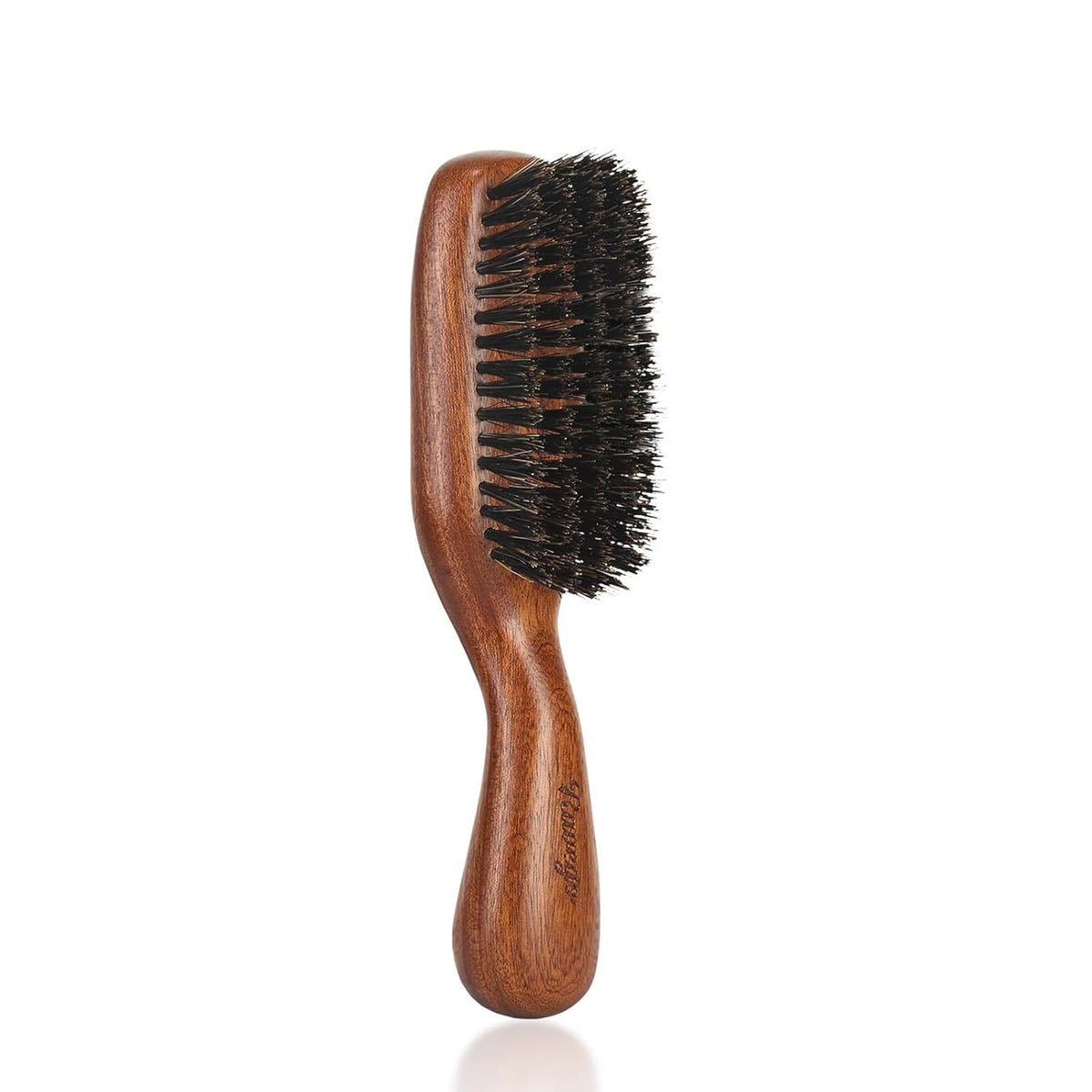 RAVEGO hair brush ergonomic-handle closeup showing comfortable grip for precise styling