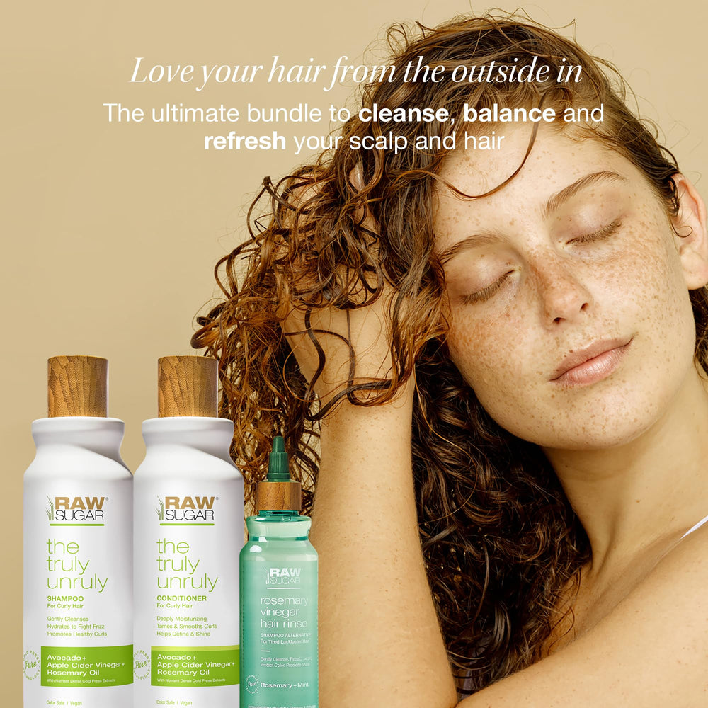 Raw Sugar Truly Unruly Shampoo closeup lather demonstrates nourishing hydration and curl definition.
