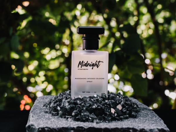 RawChemistry Midnight amber jar hints at leather-vanilla base with lasting presence.