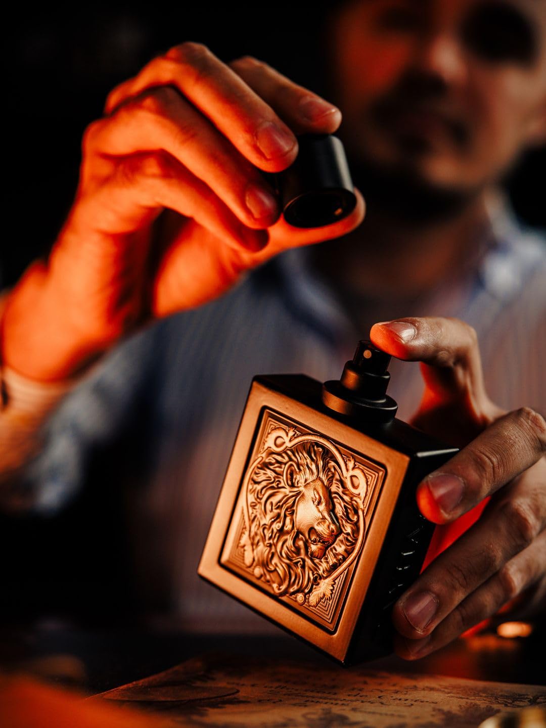 Rayhaan Lion on a dresser scene suggesting confident evening aroma.