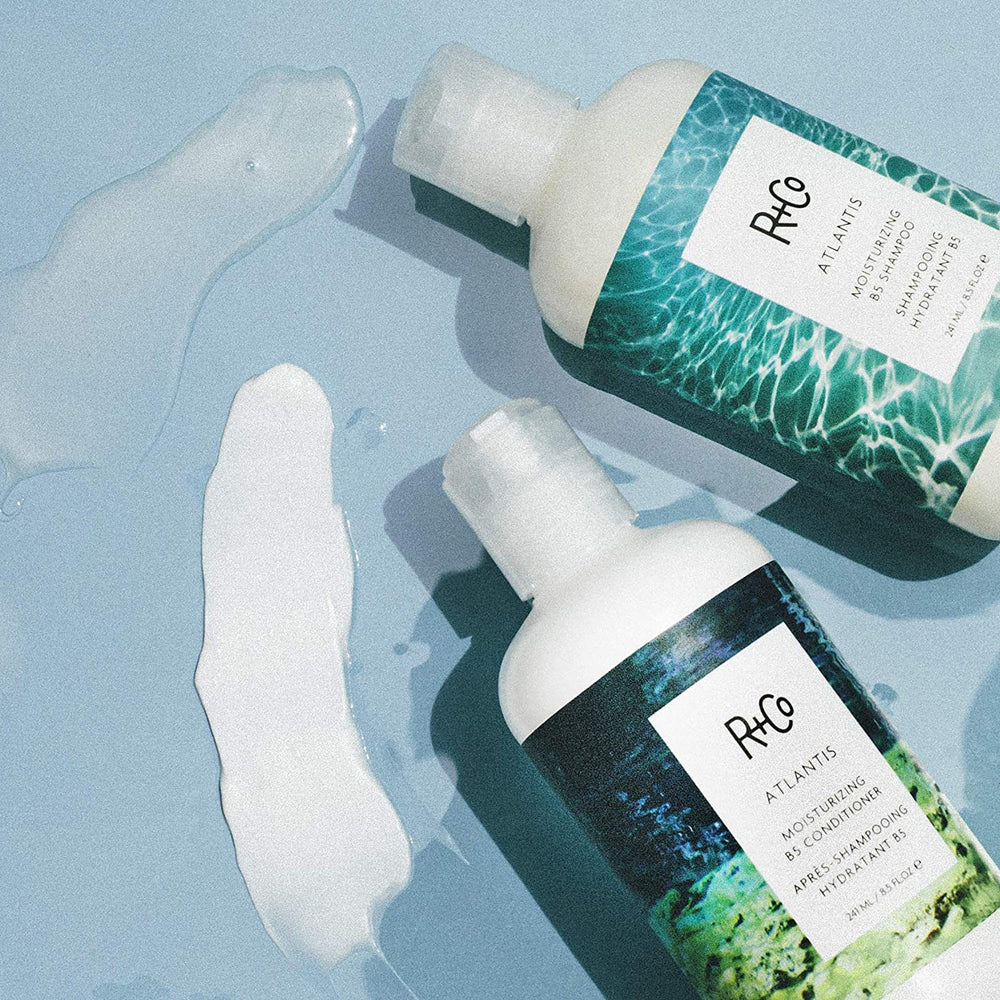 R+Co Atlantis conditioner dispense pump highlighting effortless application.