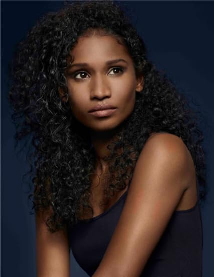 R+Co BLEU De Luxe conditioner application on hair strands for detangling.