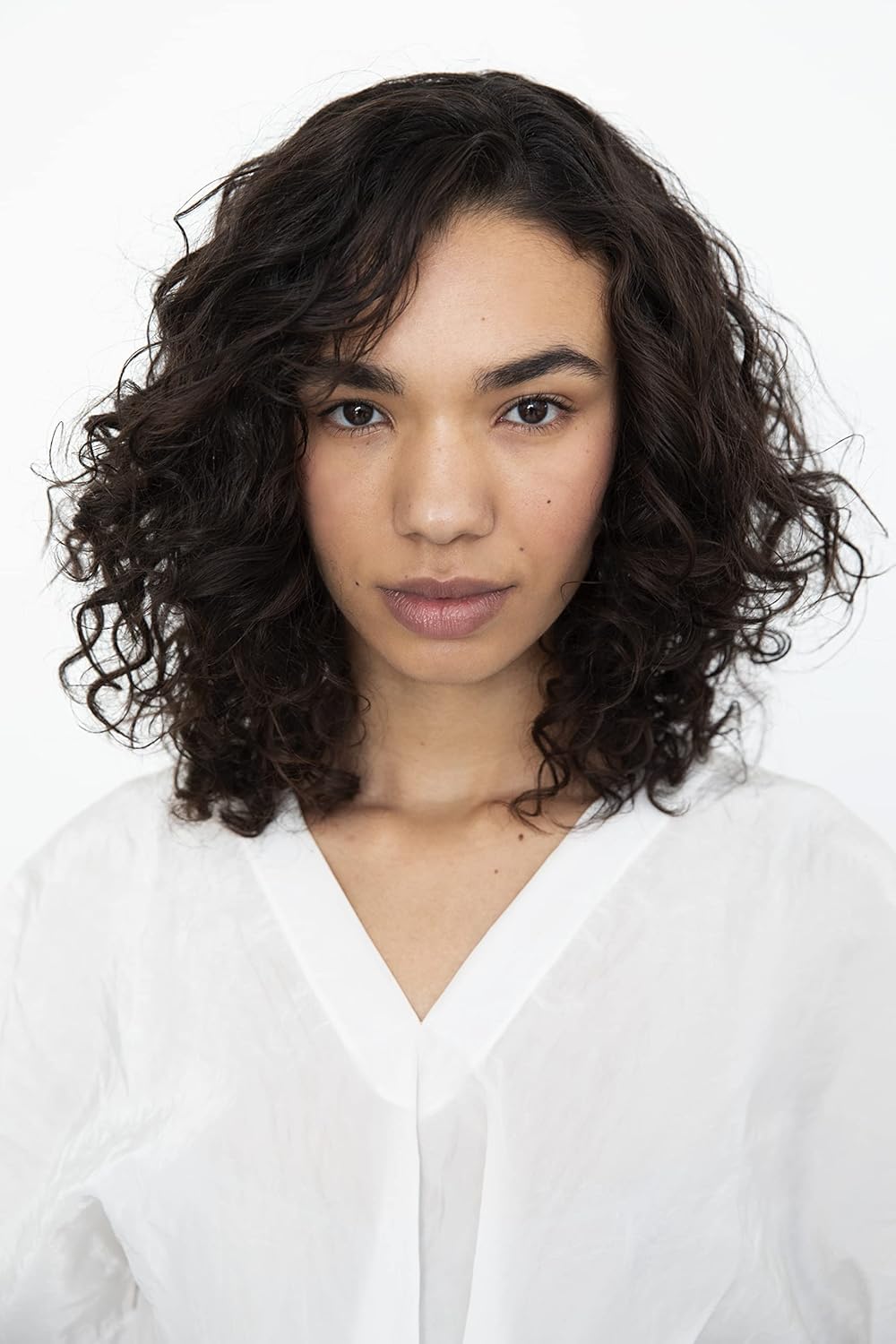 R+Co Cassette Curl results on hair showcasing defined curls and reduced frizz