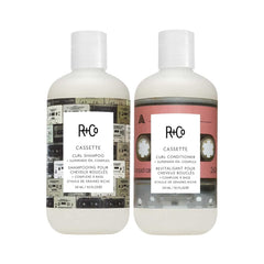 R+Co Cassette Curl Shampoo bottle closeup highlighting hydrating formula for defined curls