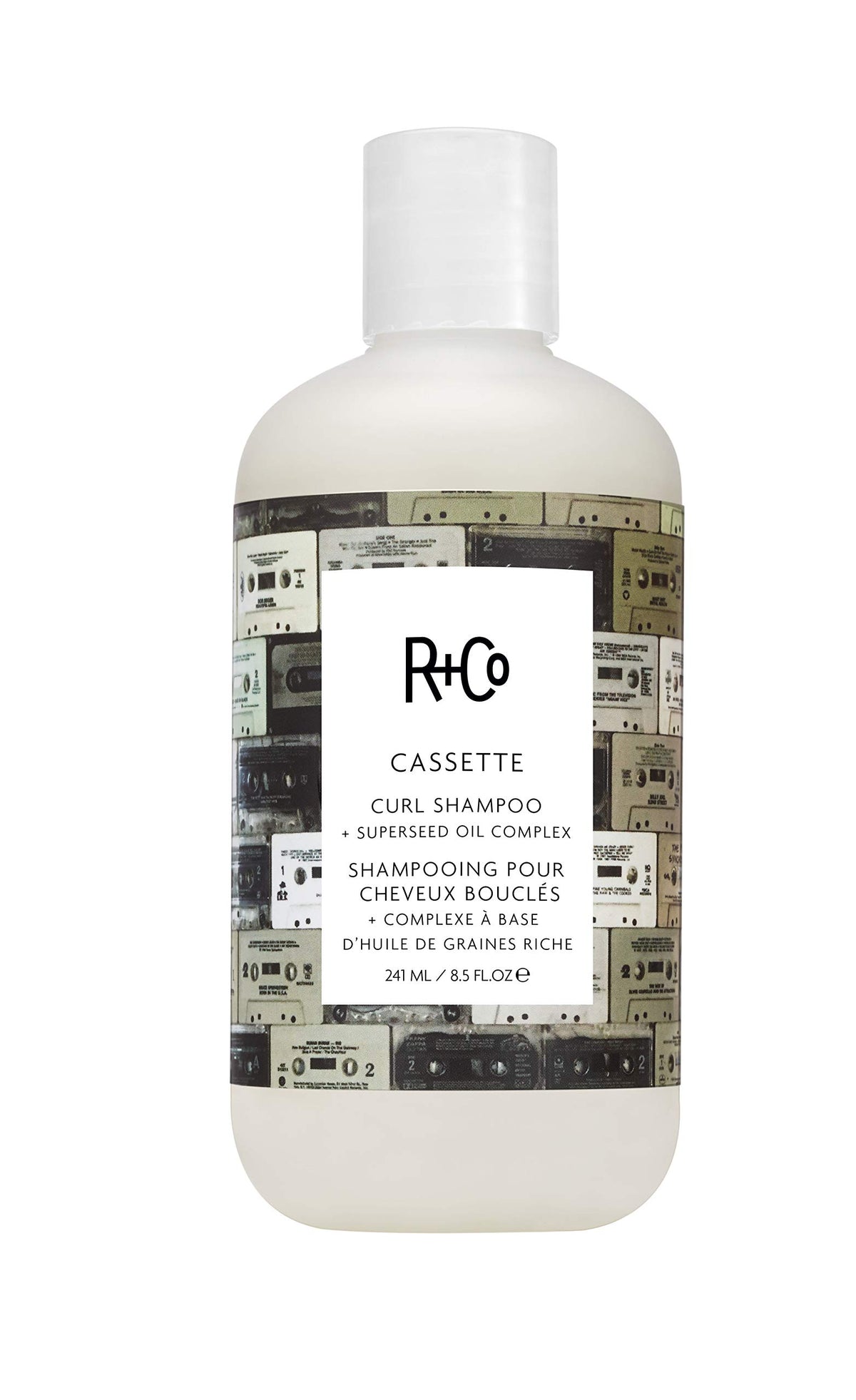 R+Co CASSETTE Curl Shampoo bottle demonstrates gentle cleansing for defined, soft curls.