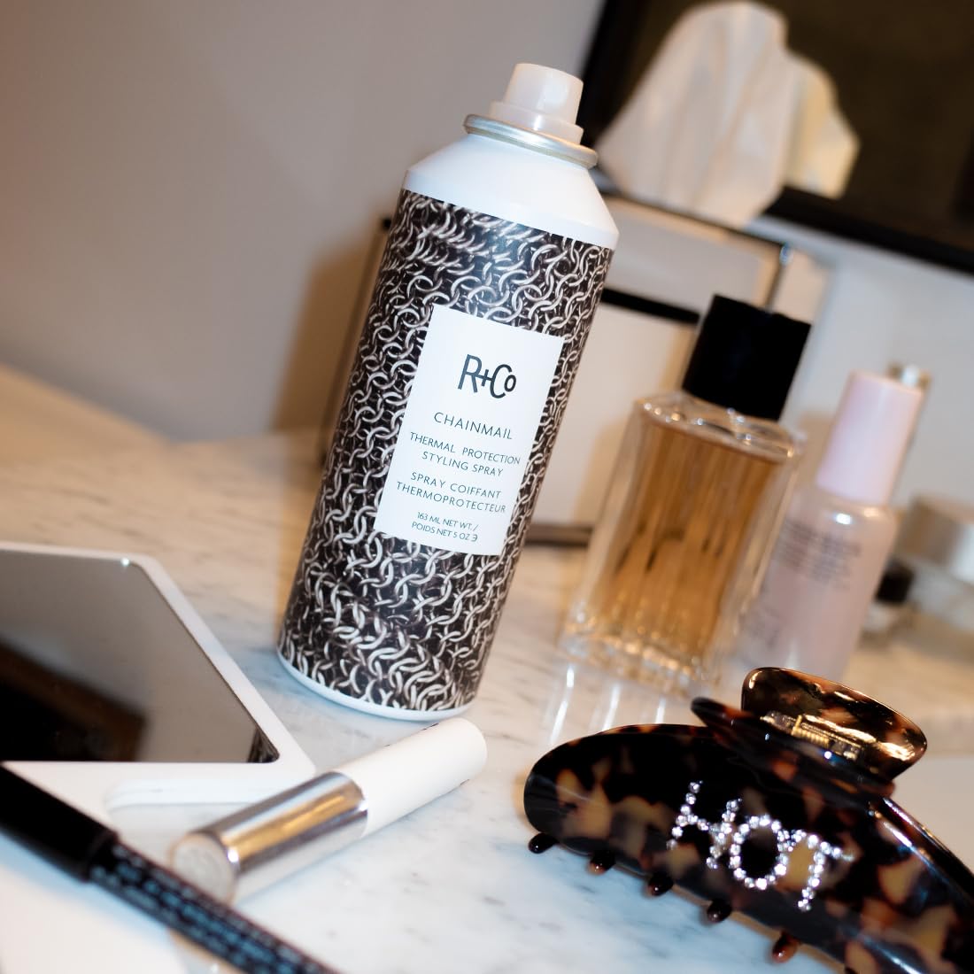 R+Co Chainmail spray-dispense delivers a fine mist for even coverage.
