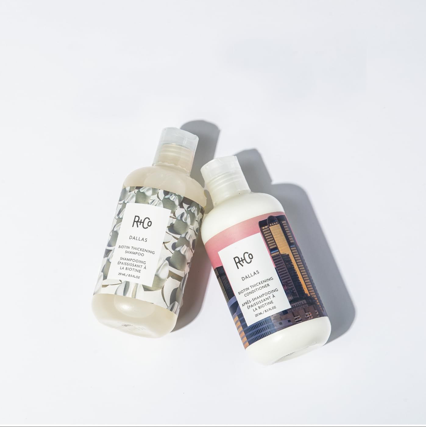 R+Co Dallas Biotin Thickening Conditioner worn on hair model showing natural volume.