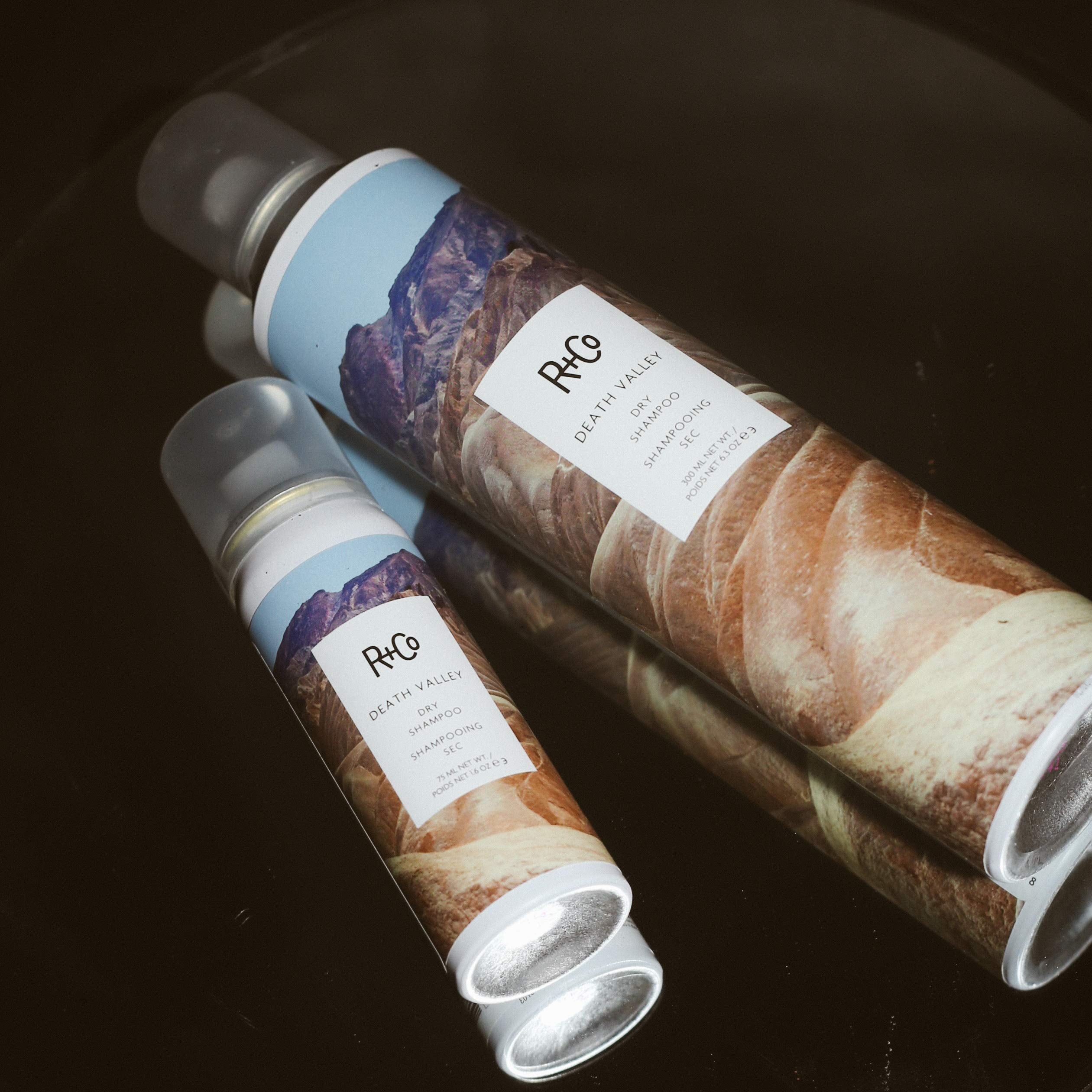 R+Co Death Valley dry shampoo on hair for UV protection and refresh.