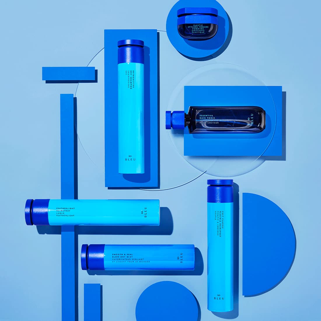 R+Co Hypersonic Heat Styling Mist on hair adding shine and softness.