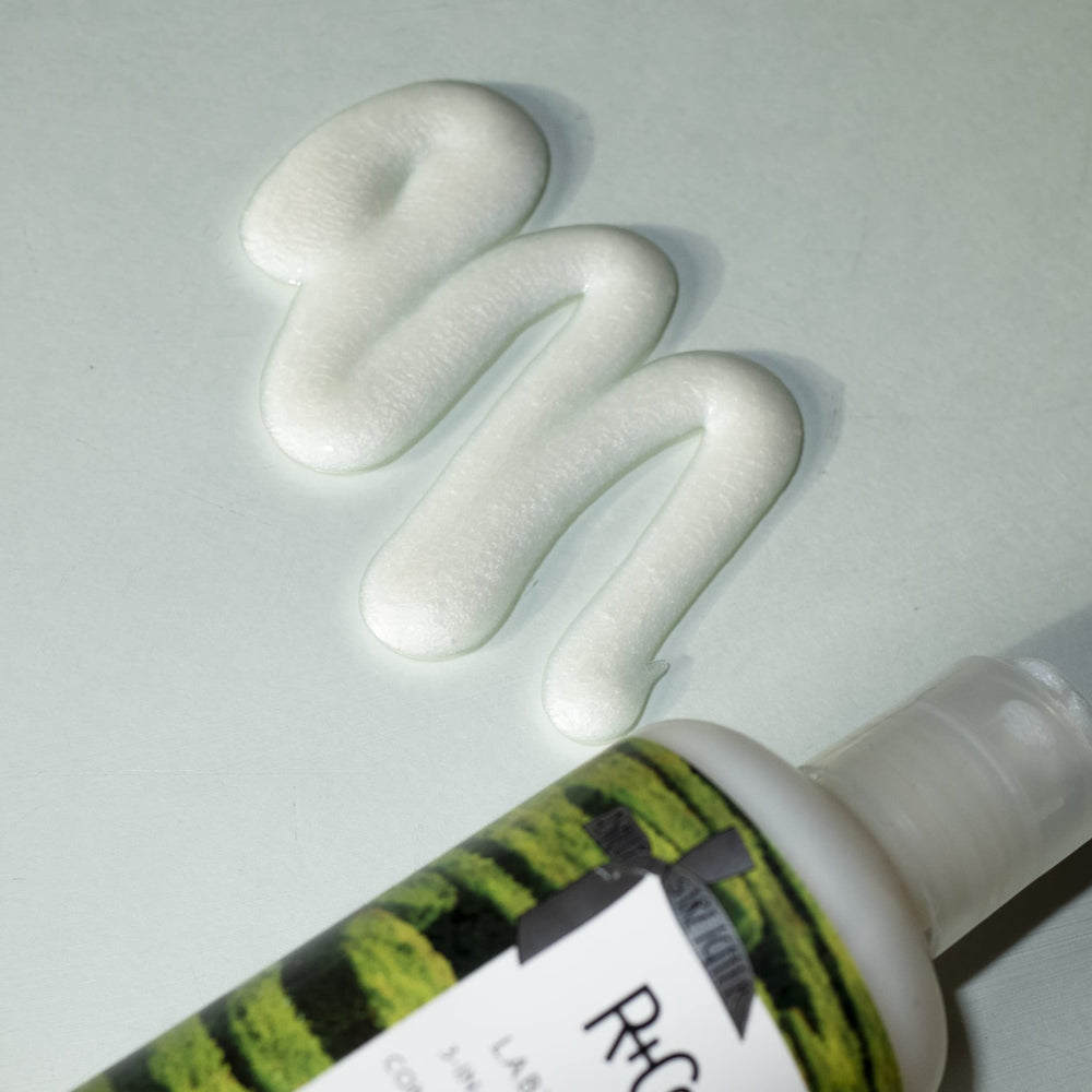 R+Co Labyrinth textured hair after shower scene shows lift and hydration.
