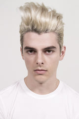 R+Co Motorcycle close-up hair shine detail highlighting texture.