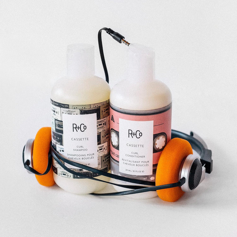 R+Co Superseed Oil Complex bottle closeup for shine and moisture