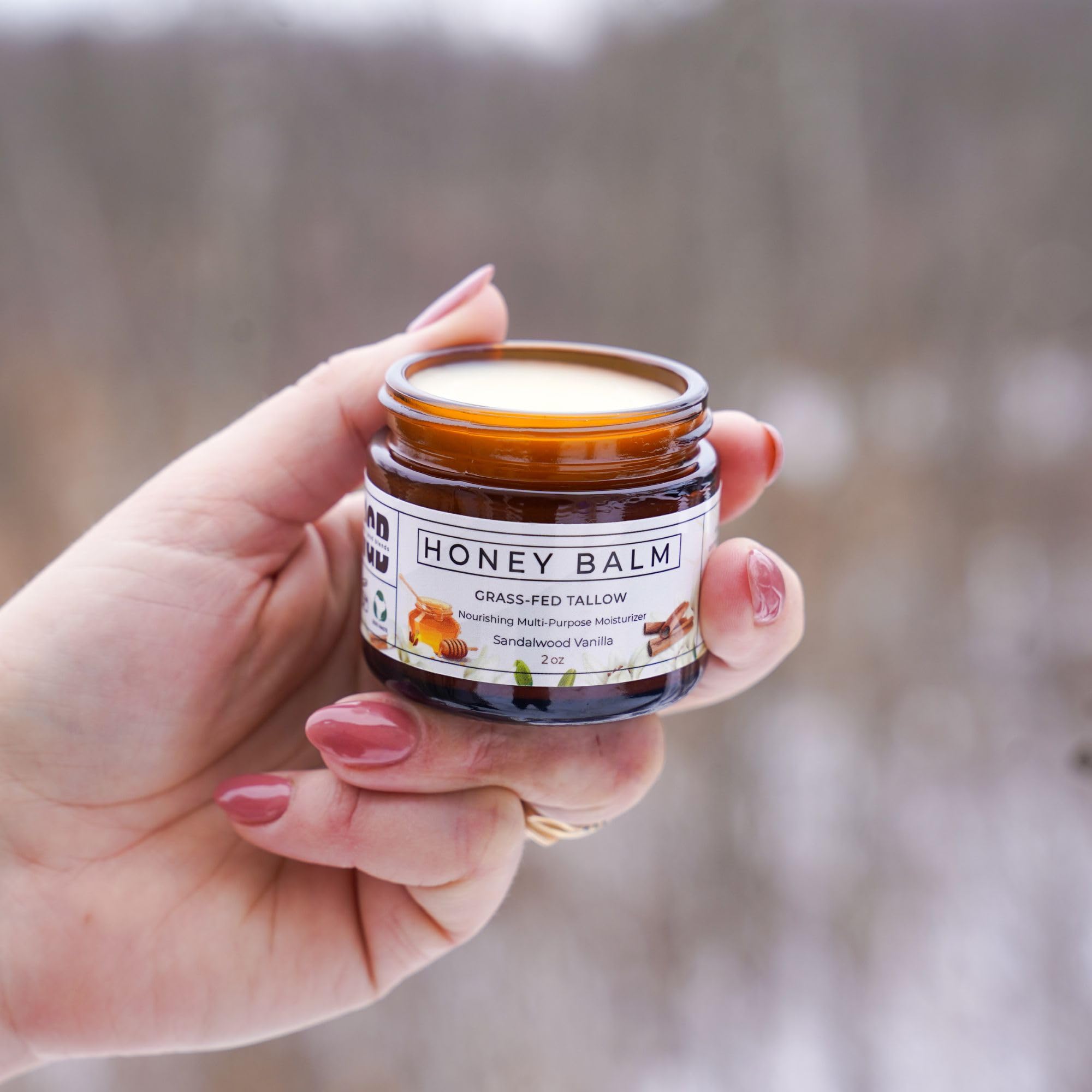 Really Good Blends Tallow Honey Balm face application demonstrates all-day hydration.