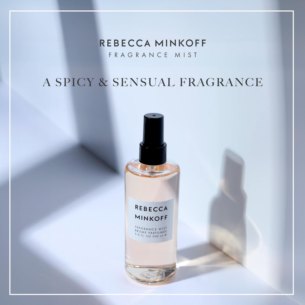 Rebecca Minkoff body spray bottle top view emphasizing sleek design for on-the-go refresh.