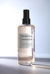 Rebecca Minkoff body spray top notes cardamom coriander bergamot deliver bright opening.