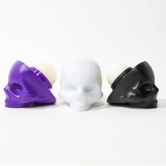 REBELS REFINERY bundle display featuring three skull lip balms for gifting