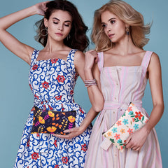Reginary makeup bag features colorful floral patterns for organized travel toiletries.