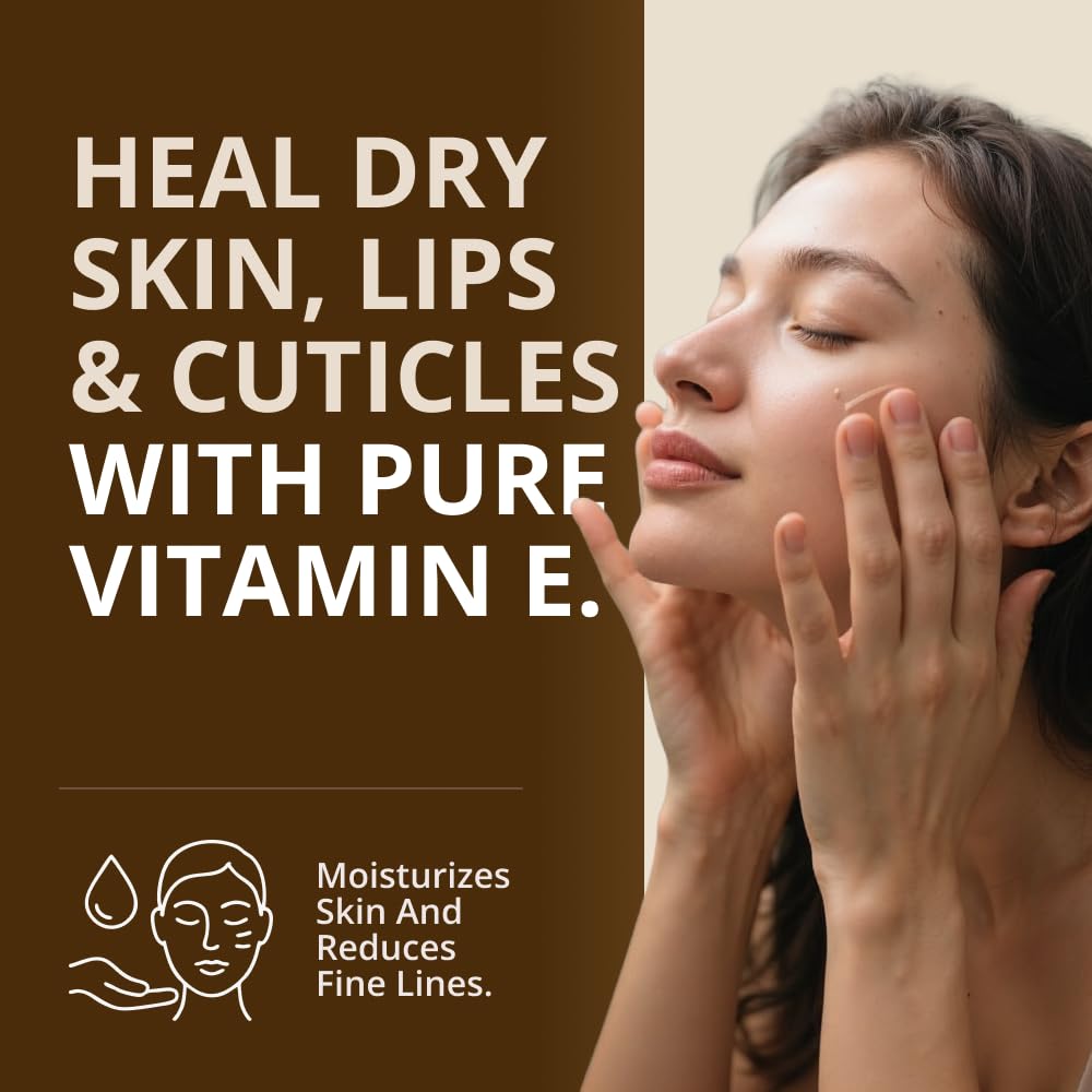 RejuveNaturals Vitamin E oil drops on skin illustrate hydration and softness.