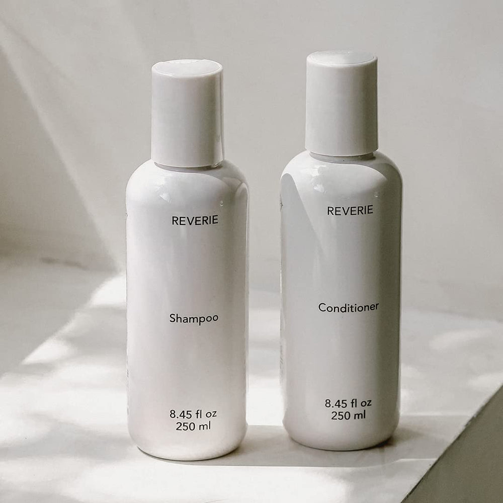 REVERIE Natural Balancing Shampoo ingredients oat proteins emphasize strengthening and conditioning.