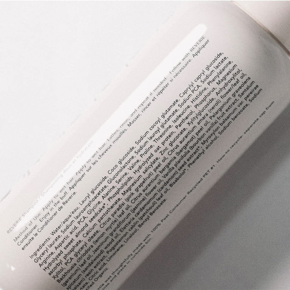 REVERIE Natural Balancing Shampoo ingredients sweet almond oil highlights nourishing botanicals.