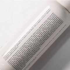 REVERIE Natural Balancing Shampoo ingredients sweet almond oil highlights nourishing botanicals.