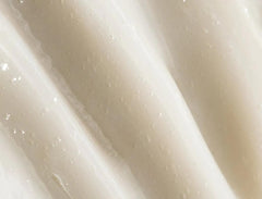 REVERIE Natural Milk Leave-In application demonstrates detangling and quick styling.