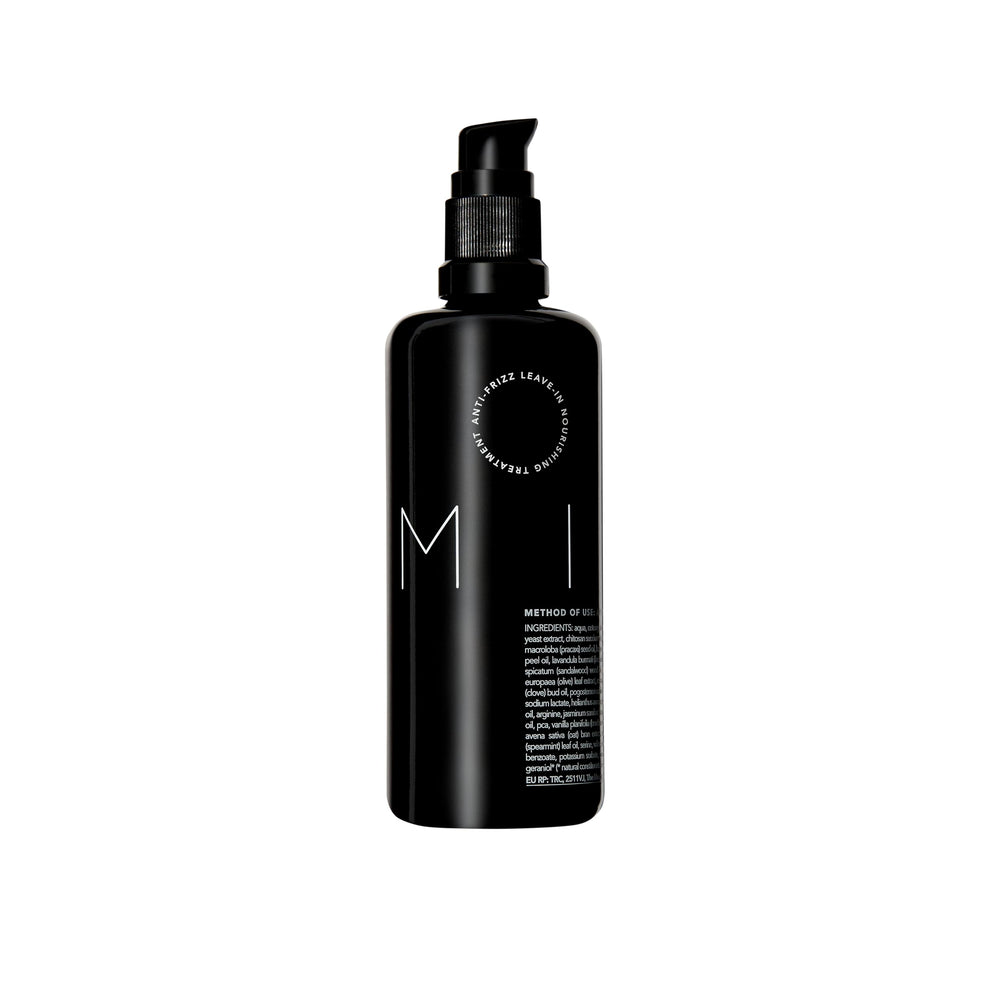 REVERIE Natural Milk Leave-In bottle showing creamy formula for frizz protection.