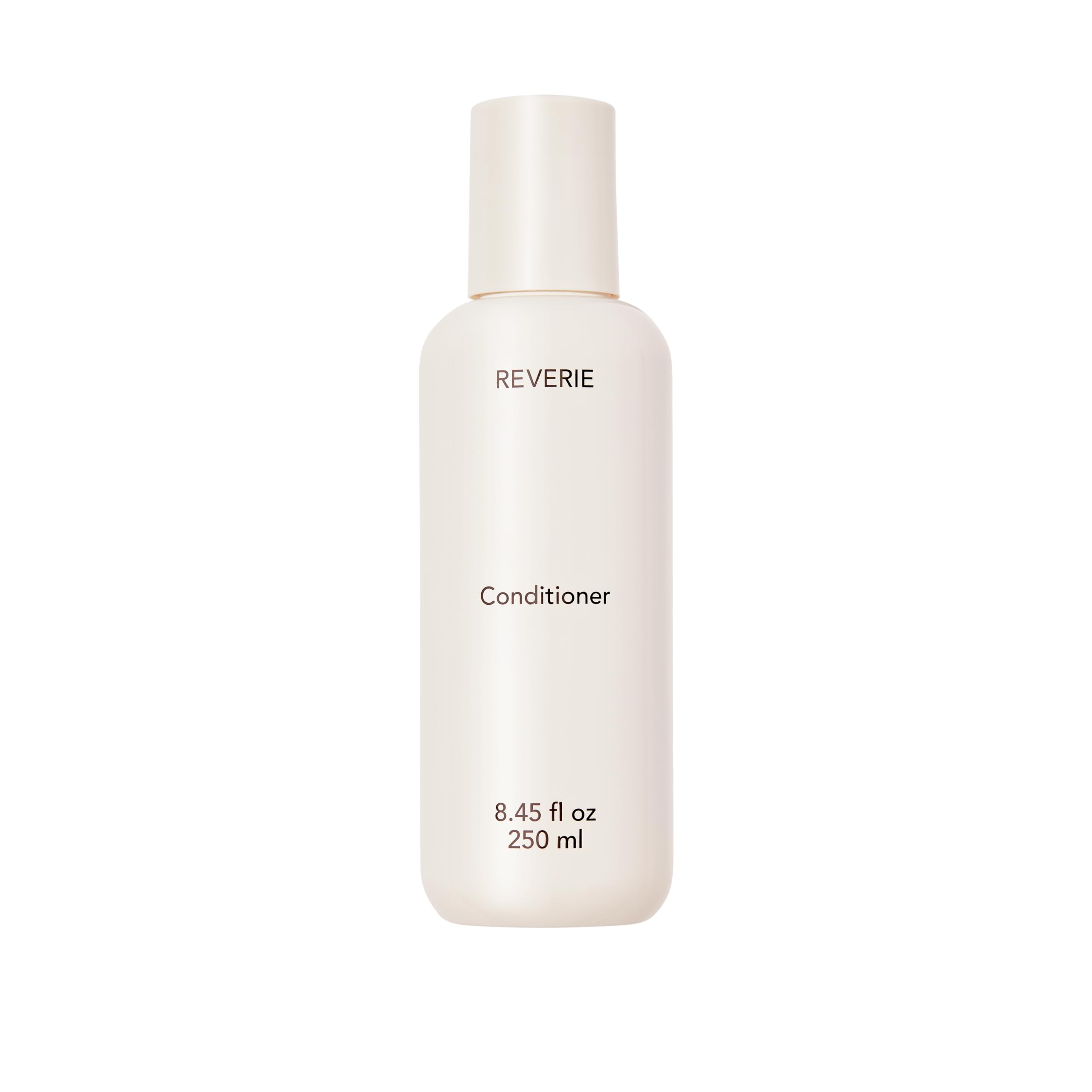 REVERIE Natural Nourishing Conditioner bottle delivering weightless hydration.