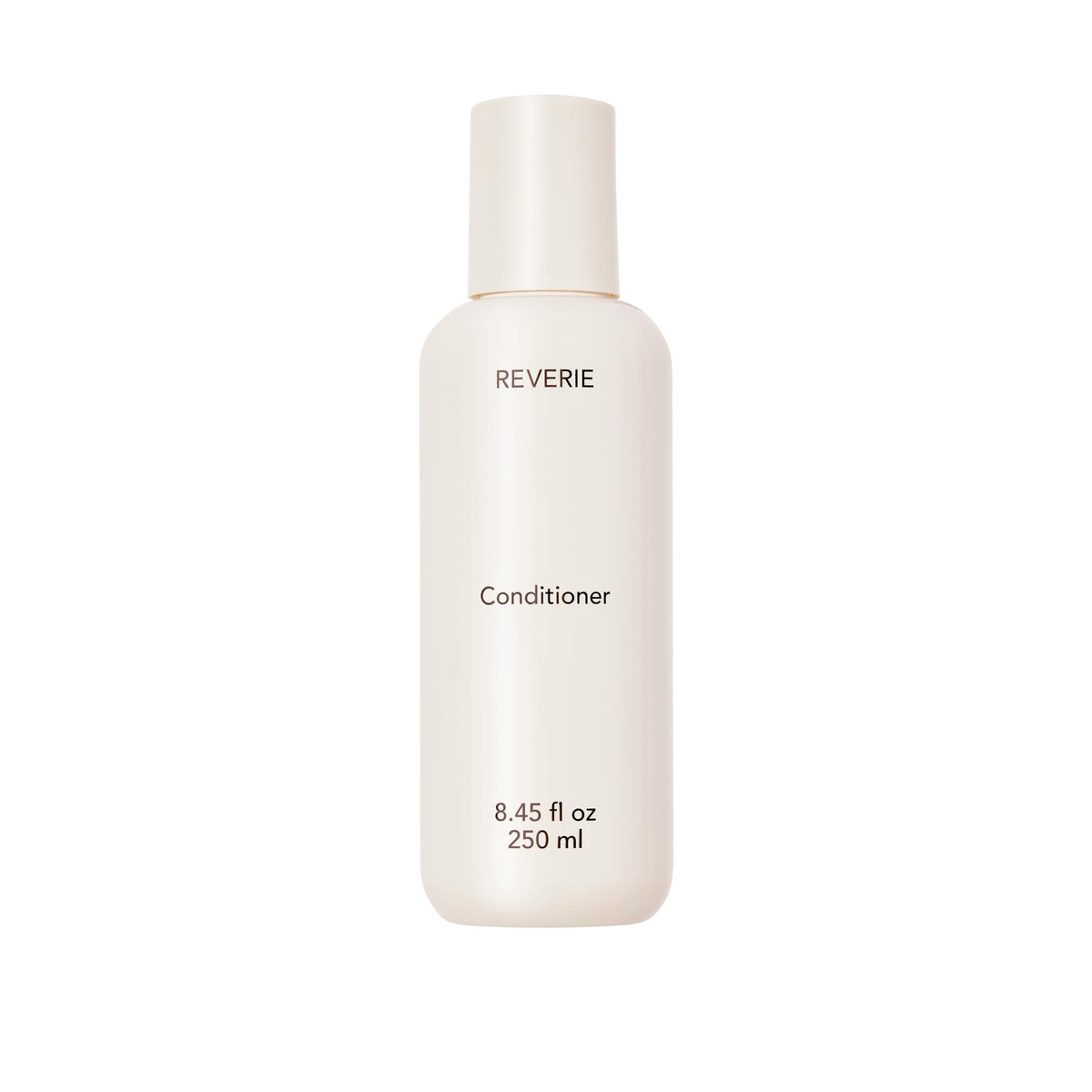 REVERIE Natural Nourishing Conditioner bottle delivering weightless hydration.
