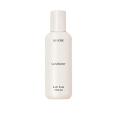 REVERIE Natural Nourishing Conditioner bottle delivering weightless hydration.