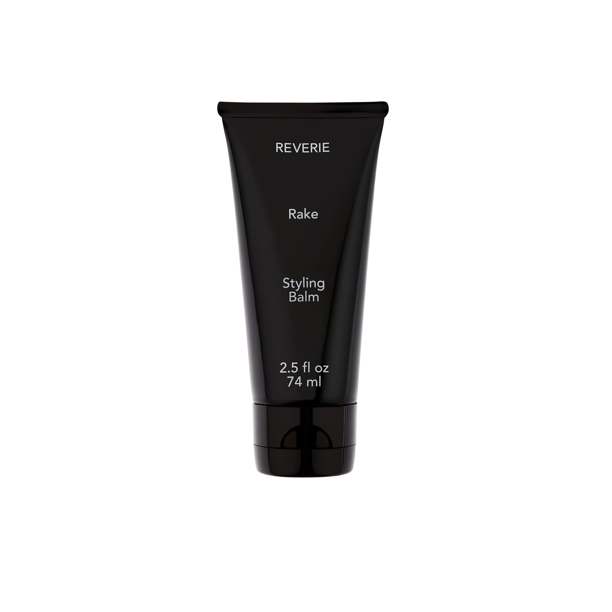 REVERIE Natural Rake Styling Balm bottle closeup for nourishing shine and lightweight hold.