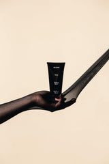REVERIE Natural Rake Styling Balm defines curls with touchable hold and light conditioning.